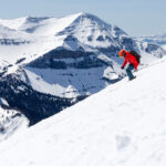 A person enjoying some of the best skiing runs in Big Sky, Montana.