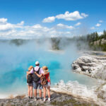 A group taking in the view on one of the best hikes in Yellowstone National Park.