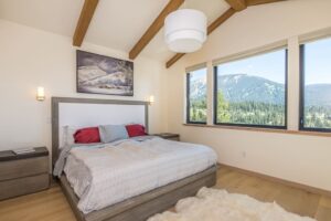 The bedroom of a Big Sky rental to relax in after exploring the best hikes and other activities in Yellowstone National Park.