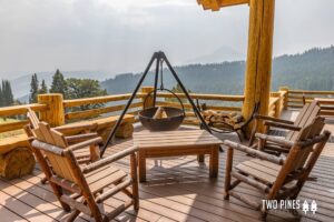 The porch of a Big Sky rental to relax on during a Montana summer getaway.