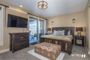 The bedroom of a Big Sky vacation rental to stay in on a Montana winter vacation.