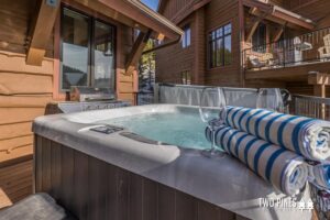 An outdoor hot tub at a Big Sky rental, something you may be looking for in your lodging.
