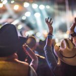 Joyful crowd enjoying live music at Huercasa Country Festival in Riaza, Segovia, Spain in 2017.