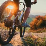 Mountain biker riding down from hill