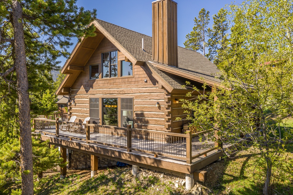 Exterior of cabin featuring a private deck